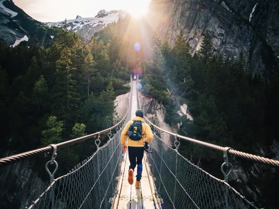 Man walking on a bridge